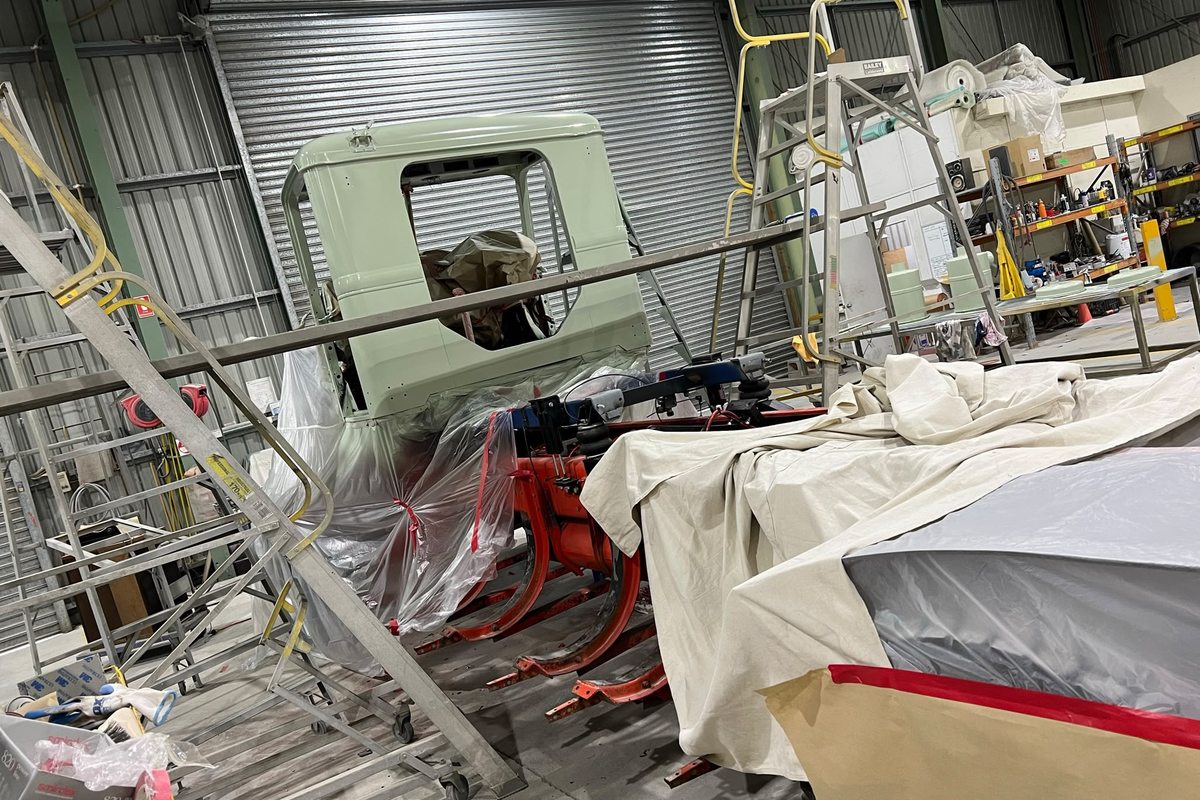 Cab being worked on with forklift